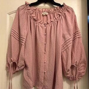 Adorable women’s pink blouse. Only worn once. From a clean, smoke free home.